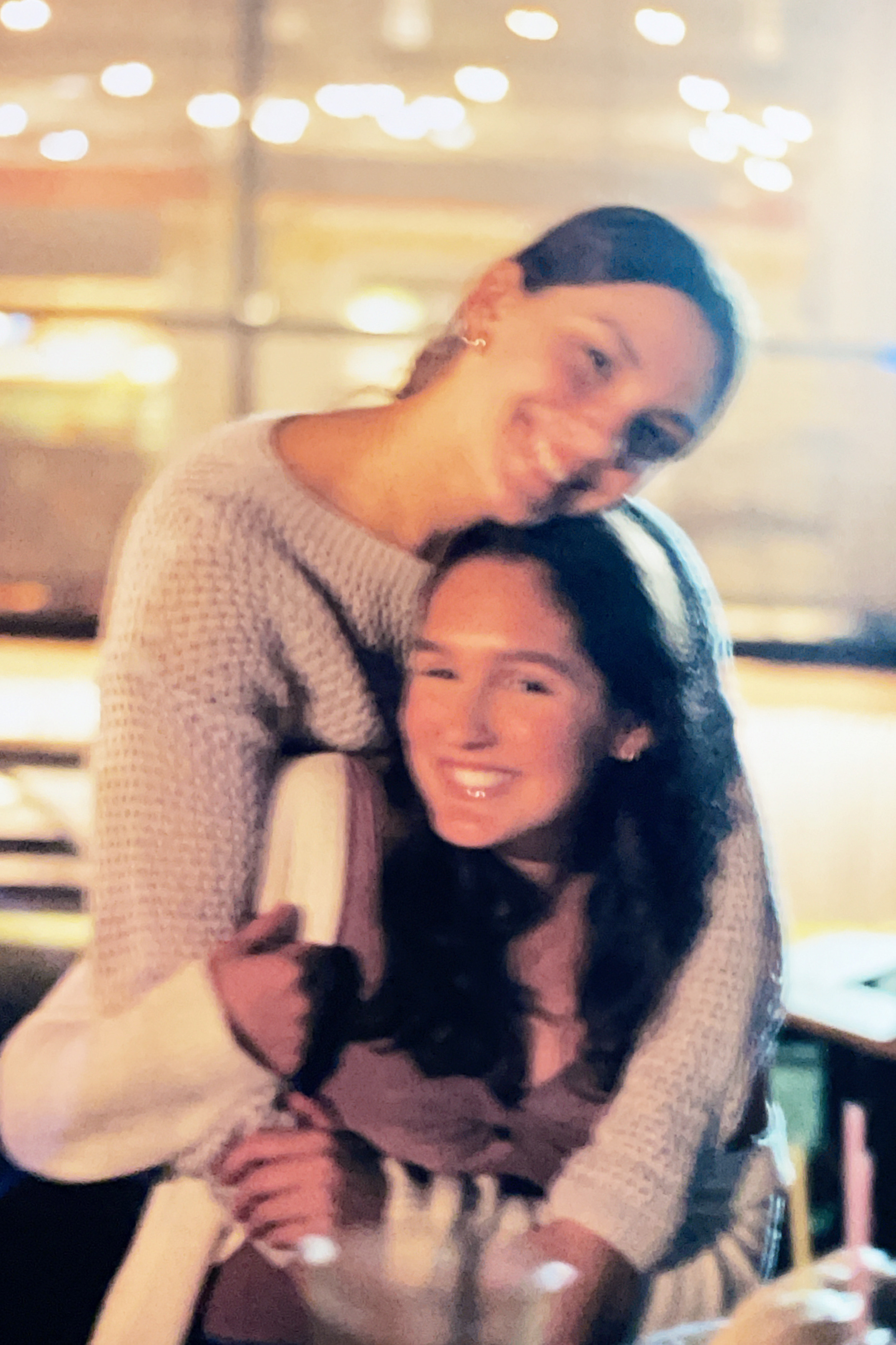 Duru hugging Avery at her birthday party